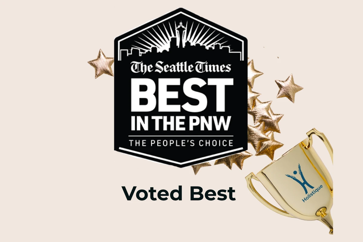 The Seattle Times Best in the PNW, The People’s Choice award badge, beside a trophy engraved with the Holistique logo