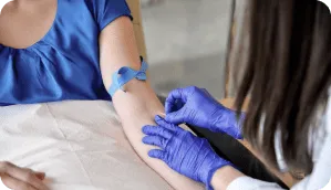 Patient receiving a blood draw for functional medicine testing