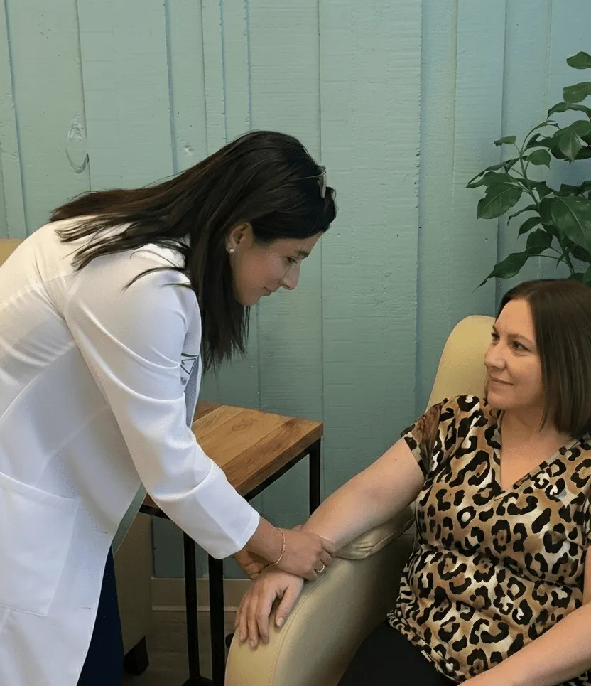 Holistique provider talking with a patient during an integrative care visit, Bellevue