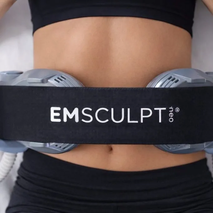 EMSCULPT NEO device applicators positioned across the abdomen at Holistique Medical Center, Bellevue
