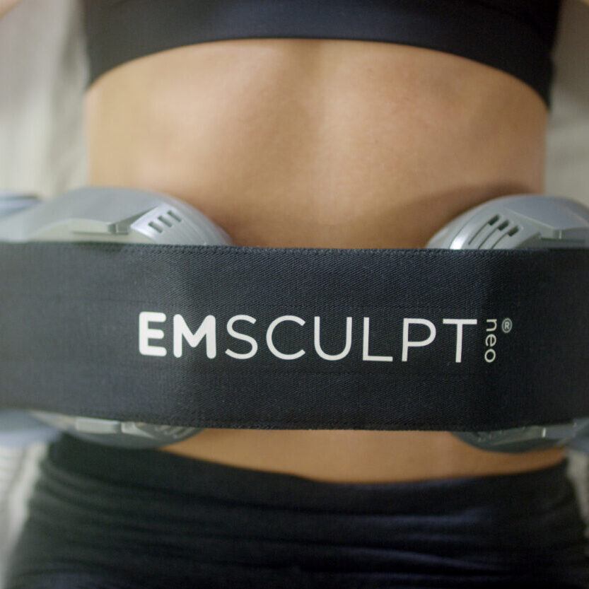 EMSCULPT NEO body sculpting treatment building muscle and reducing fat at Holistique Bellevue