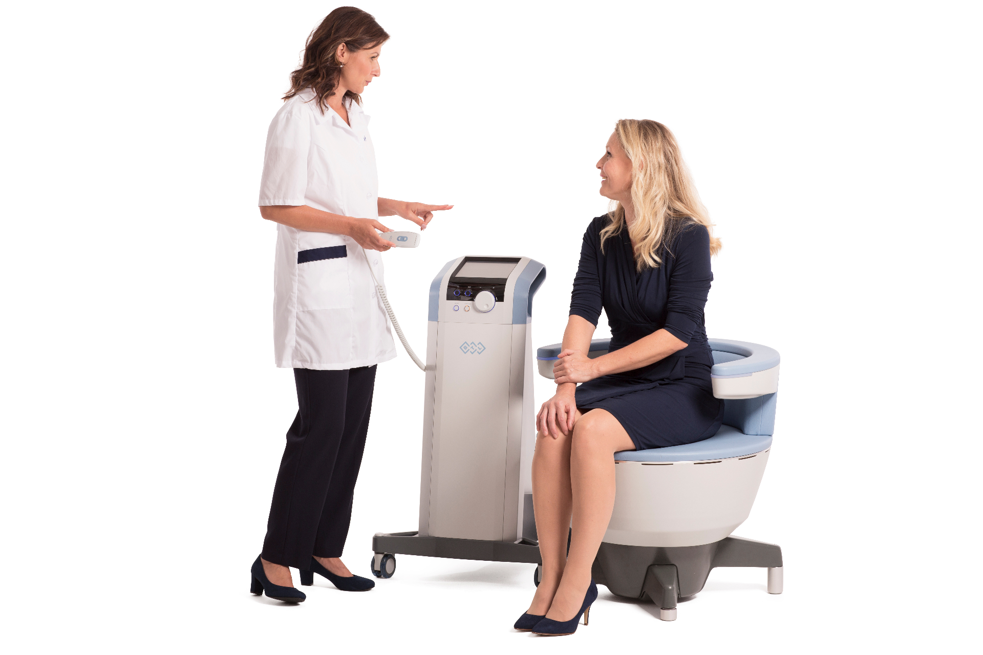 Clinician guiding a patient during EMSELLA pelvic floor therapy session at Holistique Medical Center in Bellevue